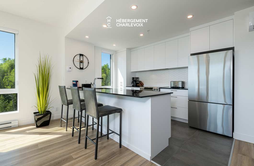 MGR-750 :  Condo 2e & 3e étage - Aux premières loges du levée du Soleil et du St-Laurent