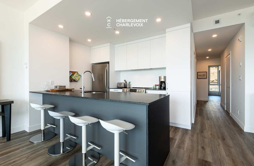 MGR-750 :  Condo 2e & 3e étage - Aux premières loges du levée du Soleil et du St-Laurent