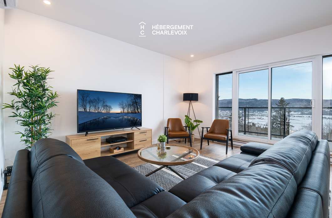 MGR-750 :  Condo 2e & 3e étage - Aux premières loges du levée du Soleil et du St-Laurent