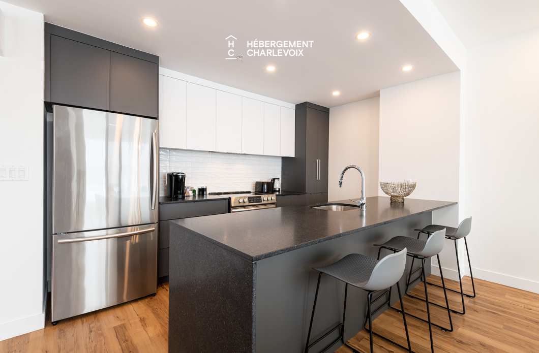 MGR-750 :  Condo 2e & 3e étage - Aux premières loges du levée du Soleil et du St-Laurent