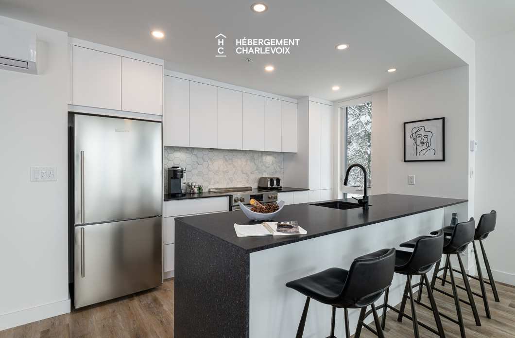 MGR-750 :  Condo 2e & 3e étage - Aux premières loges du levée du Soleil et du St-Laurent
