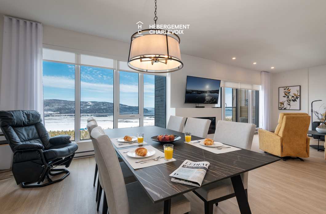 MGR-750 :  Condo 2e & 3e étage - Aux premières loges du levée du Soleil et du St-Laurent