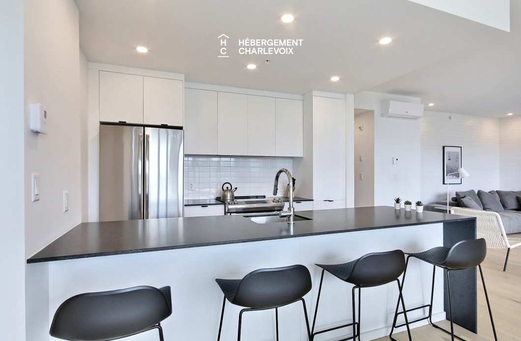 MGR-750 :  Condo 2e & 3e étage - Aux premières loges du levée du Soleil et du St-Laurent