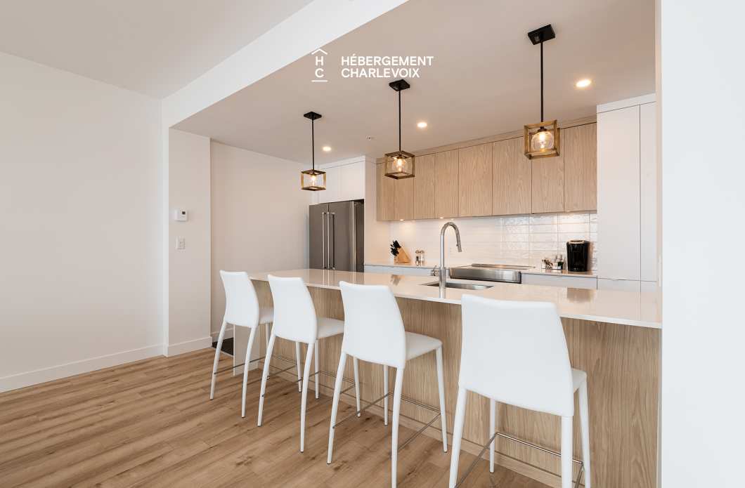 MGR-750 :  Condo 2e & 3e étage - Aux premières loges du levée du Soleil et du St-Laurent