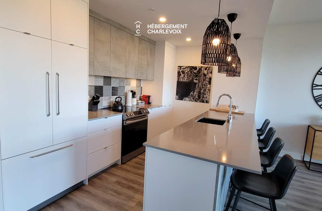 MGR-750 :  Condo 2e & 3e étage - Aux premières loges du levée du Soleil et du St-Laurent