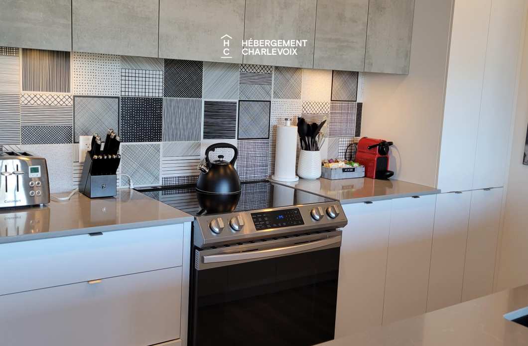 MGR-750 :  Condo 2e & 3e étage - Aux premières loges du levée du Soleil et du St-Laurent