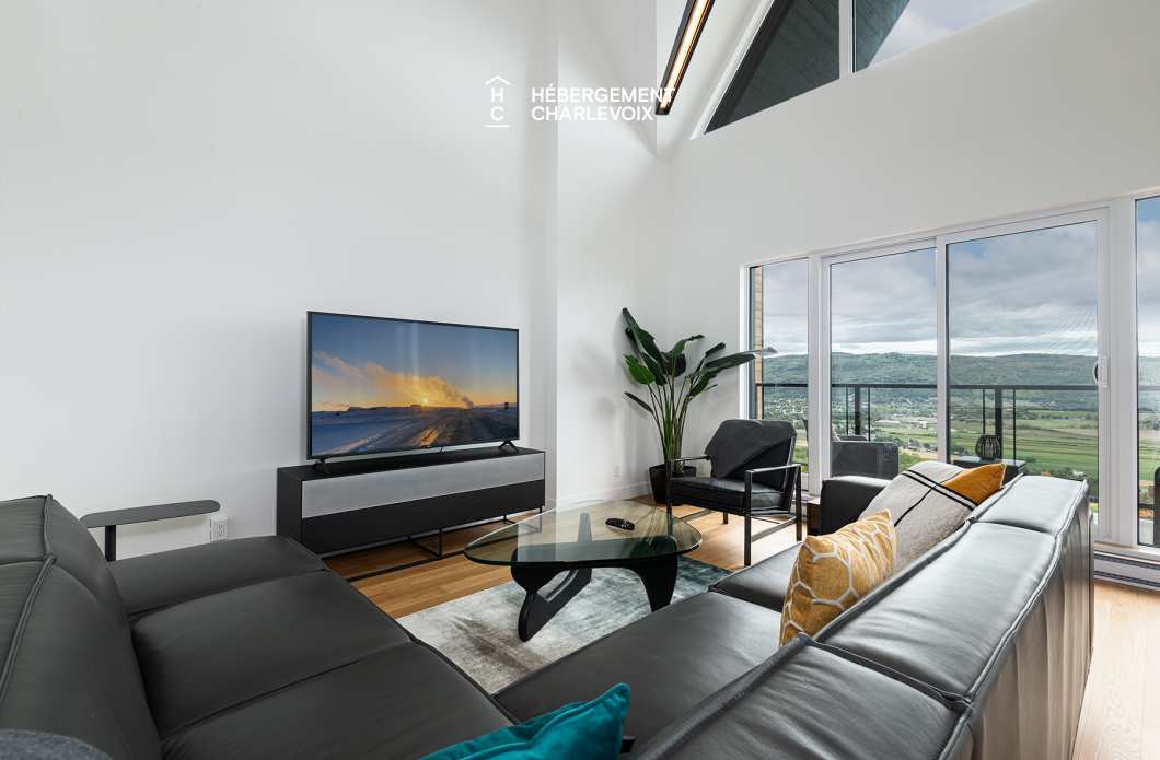 MGR-750:  Condo 4e étage - Penthouse avec vue, perché au-dessus du Fleuve St-Laurent.