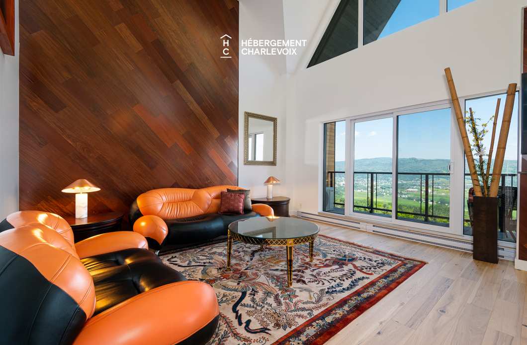 MGR-750:  Condo 4e étage - Penthouse avec vue, perché au-dessus du Fleuve St-Laurent.
