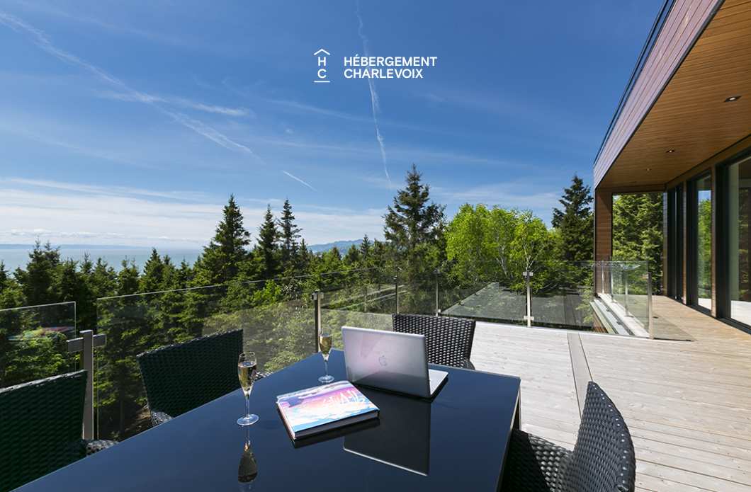 ABS-595 - Un feu de foyer suspendu dans un chalet de luxe à louer dans Charlevoix.