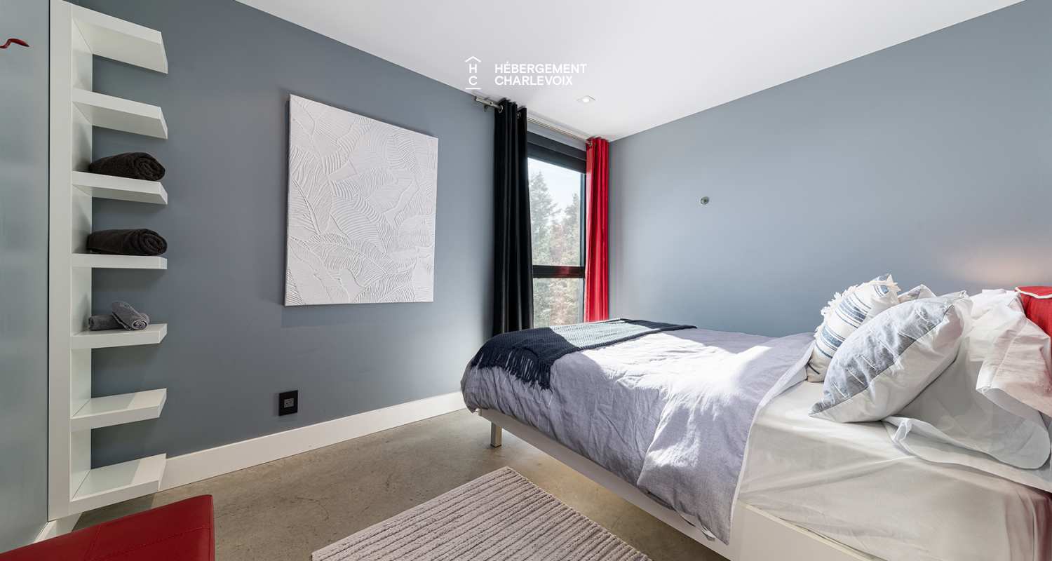 ABS-595 - Un feu de foyer suspendu dans un chalet de luxe à louer dans Charlevoix.