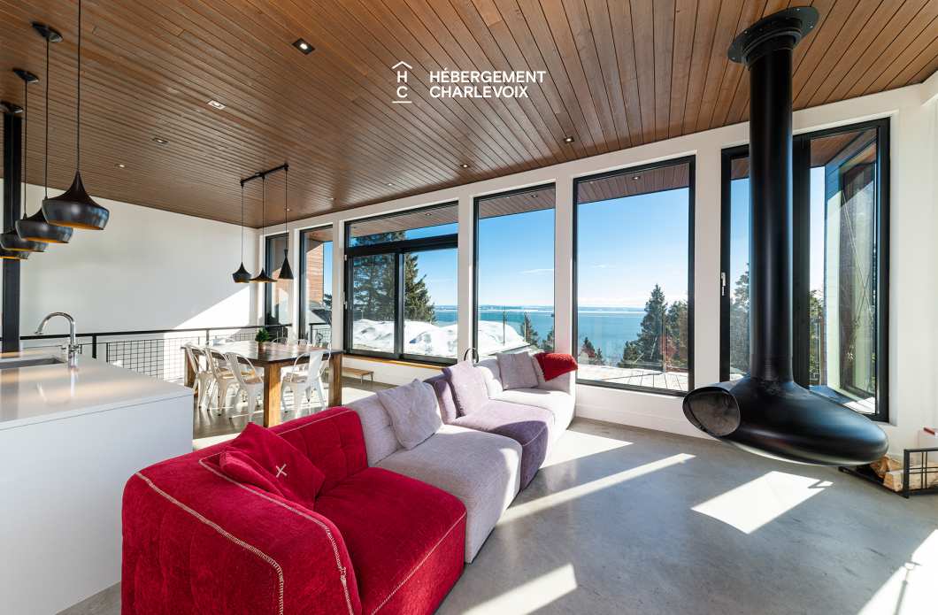 ABS-595 - Un feu de foyer suspendu dans un chalet de luxe à louer dans Charlevoix.