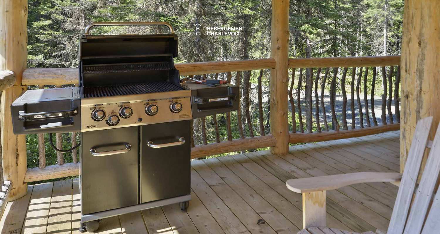 CAB-30 - A very large half-log cabin in the heart of the Canadian forest.