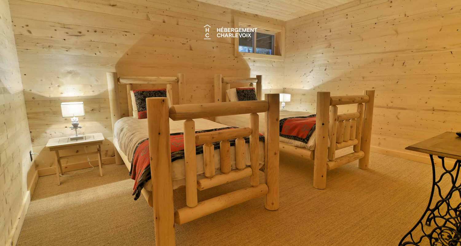 CAB-30 - A very large half-log cabin in the heart of the Canadian forest.