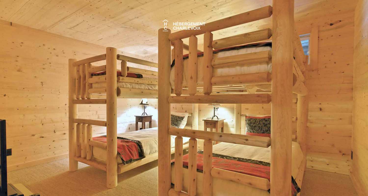 CAB-30 - A very large half-log cabin in the heart of the Canadian forest.