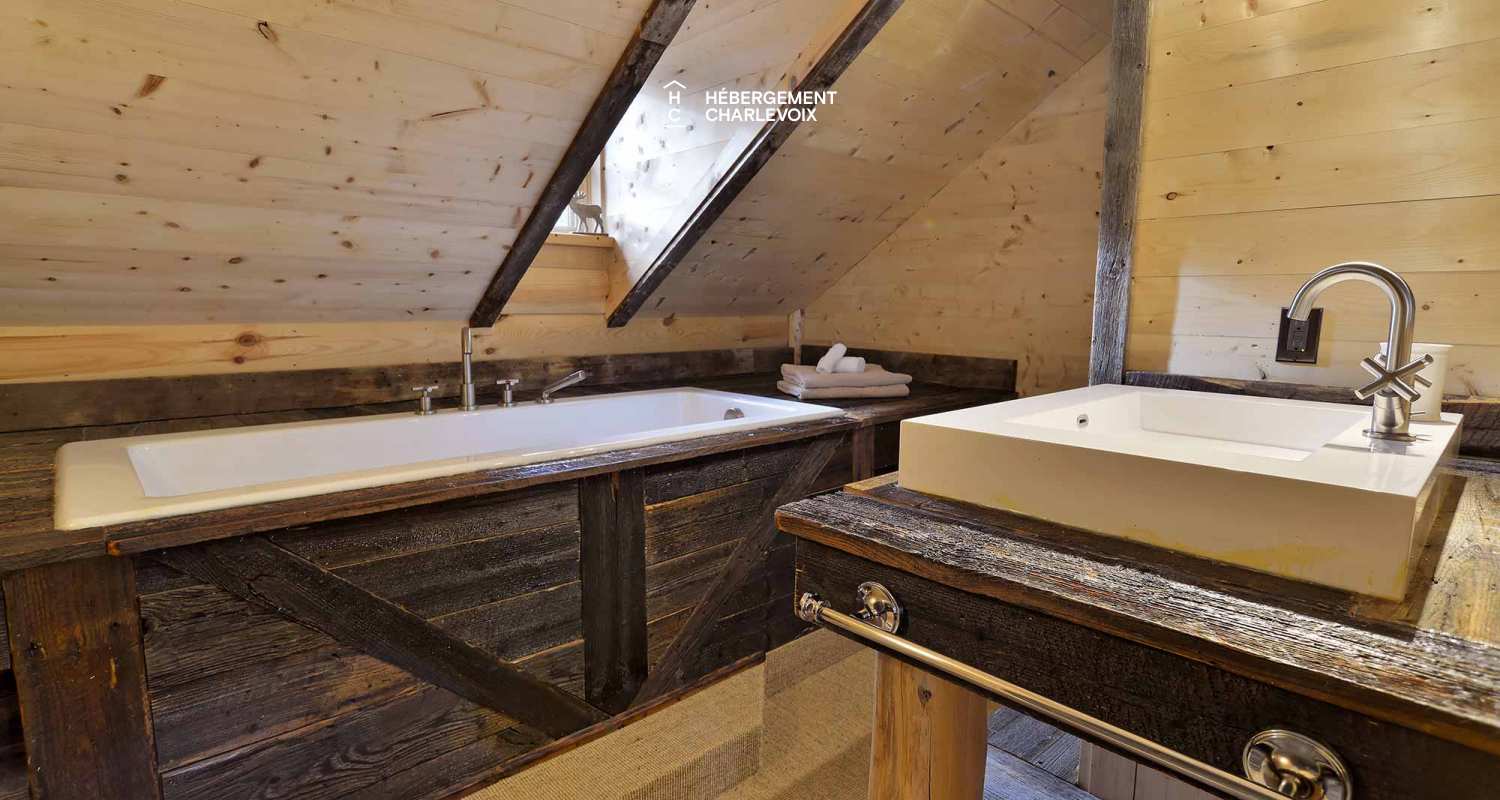 CAB-30 - A very large half-log cabin in the heart of the Canadian forest.