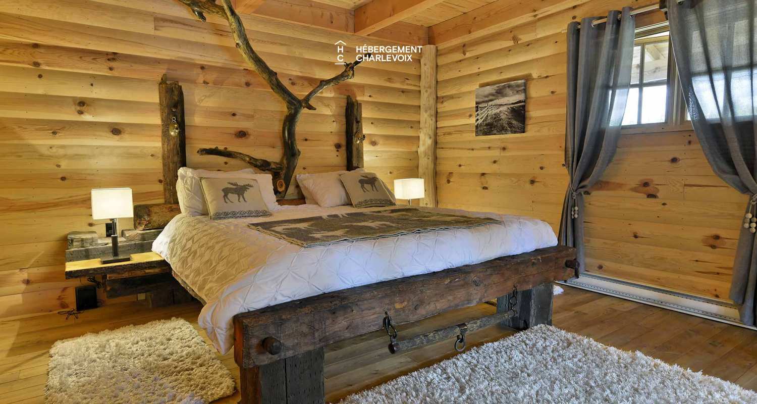 CAB-30 - A very large half-log cabin in the heart of the Canadian forest.