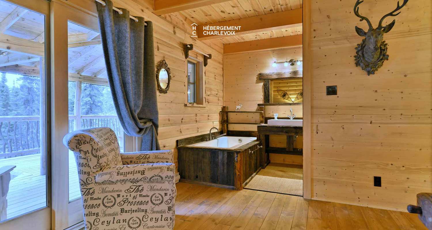 CAB-30 - A very large half-log cabin in the heart of the Canadian forest.