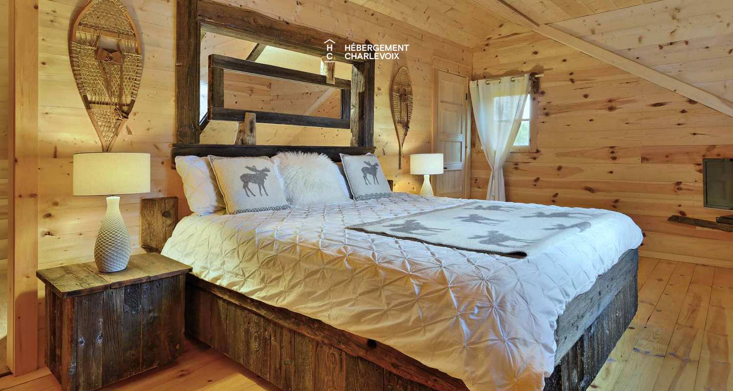 CAB-30 - A very large half-log cabin in the heart of the Canadian forest.