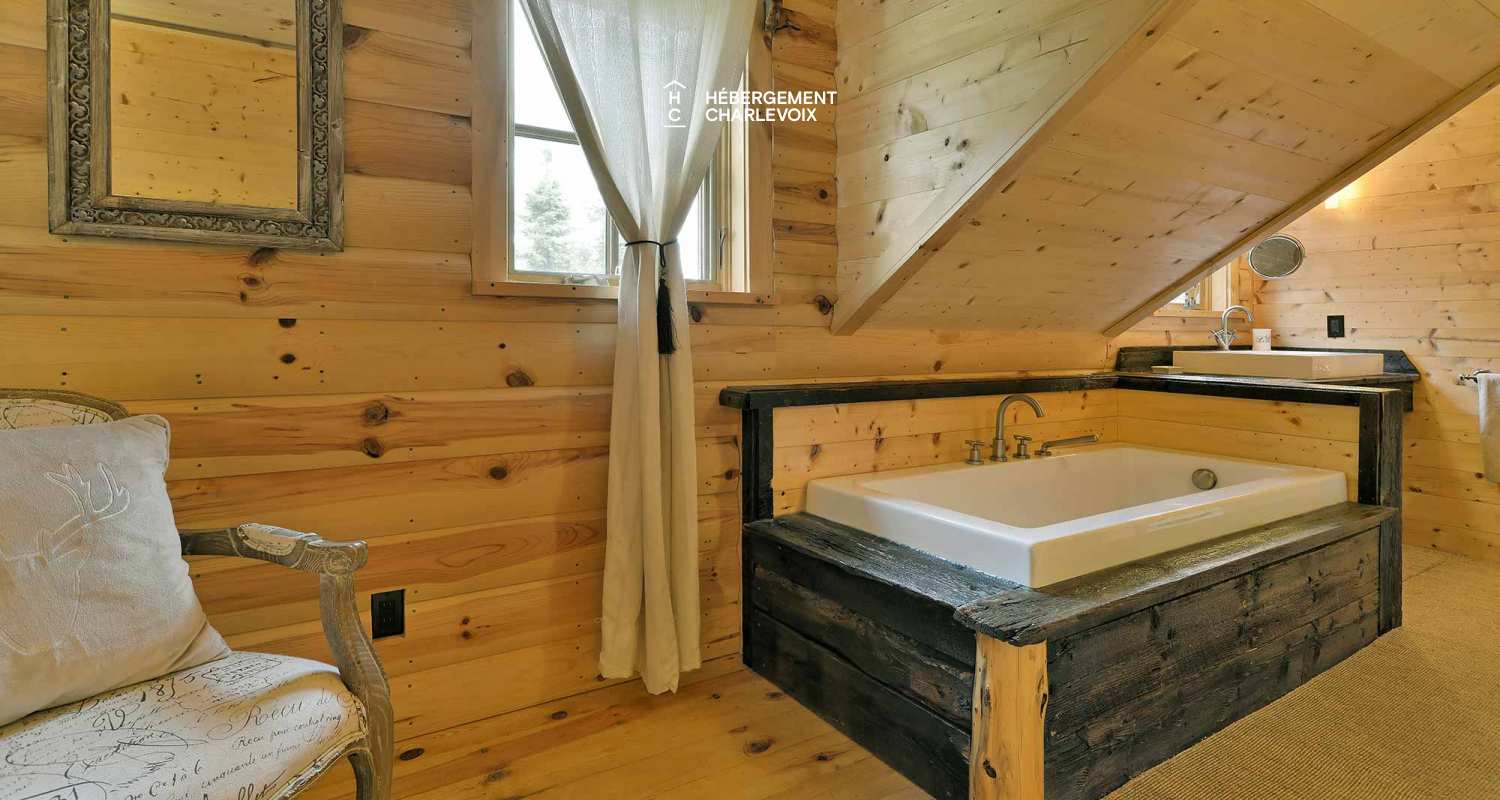 CAB-30 - A very large half-log cabin in the heart of the Canadian forest.