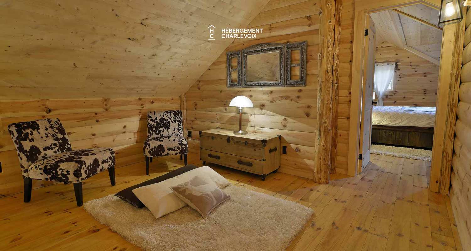 CAB-30 - A very large half-log cabin in the heart of the Canadian forest.