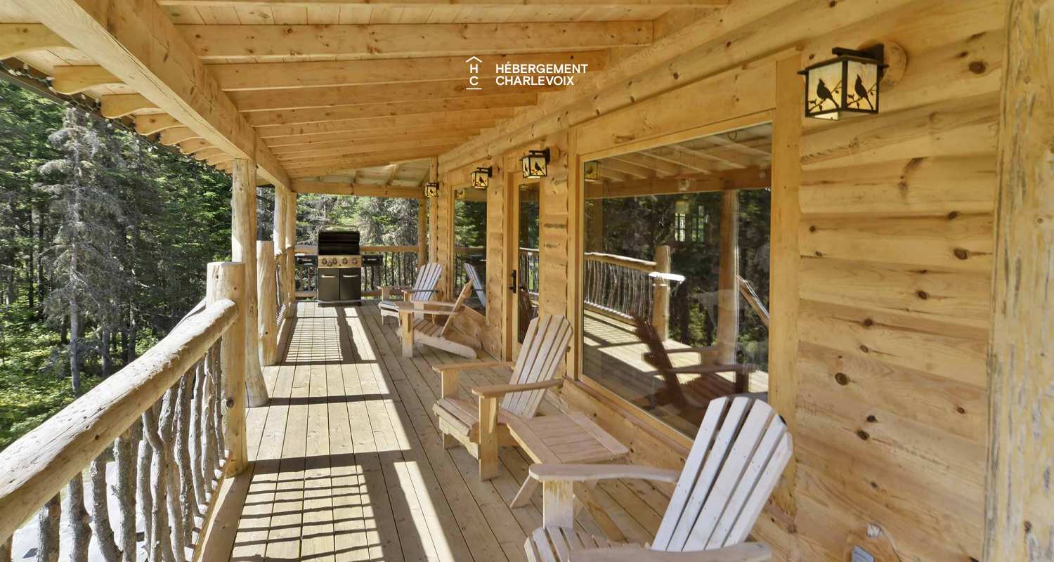 CAB-30 - A very large half-log cabin in the heart of the Canadian forest.