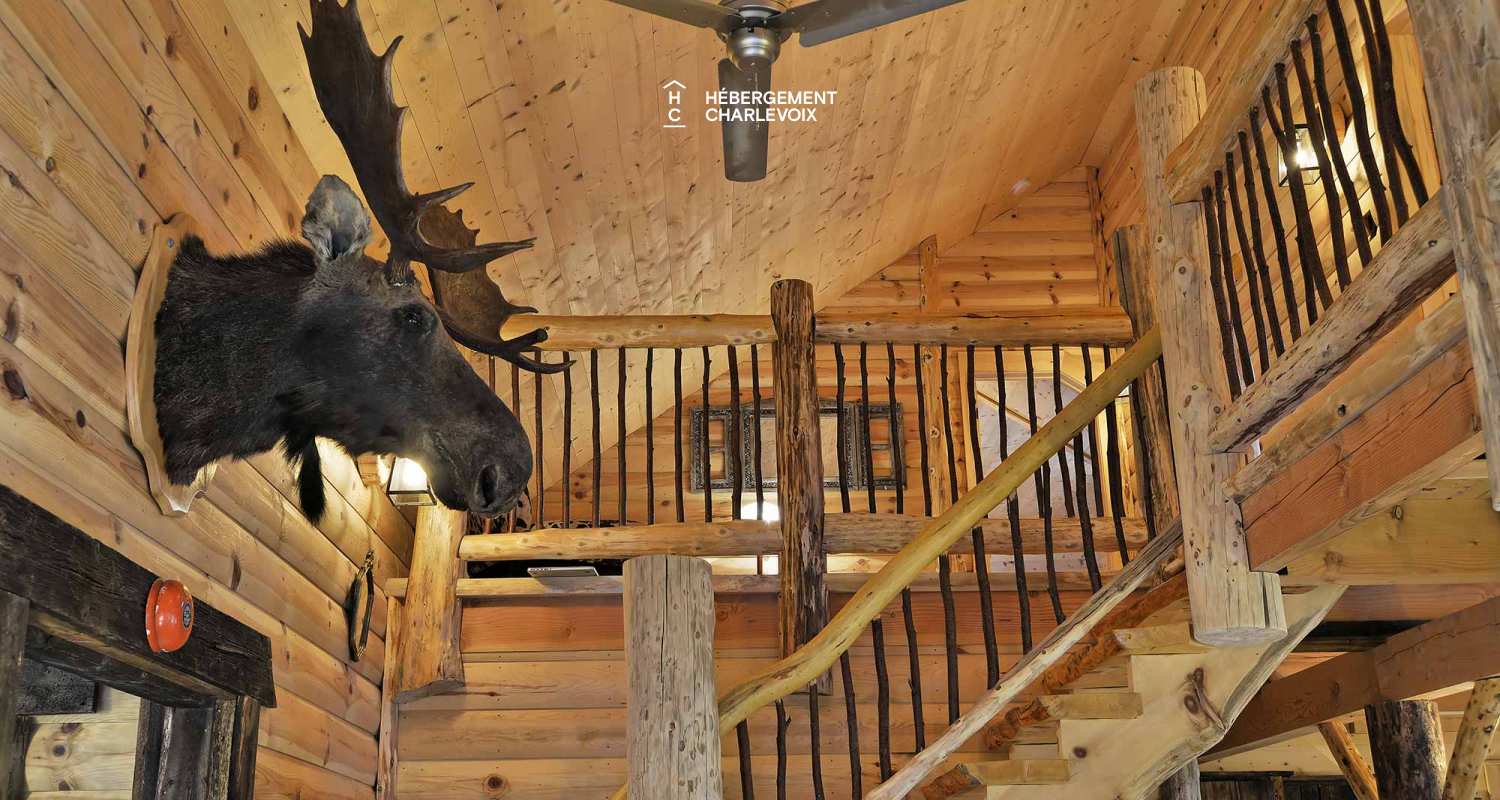 CAB-30 - A very large half-log cabin in the heart of the Canadian forest.