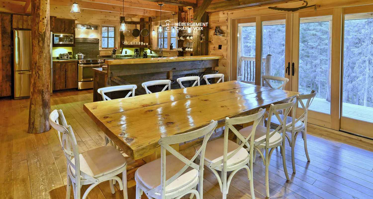 CAB-30 - A very large half-log cabin in the heart of the Canadian forest.