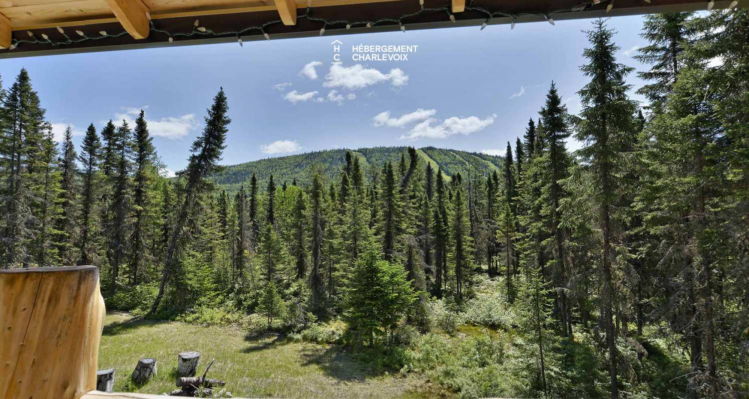 CAB-30 - A very large half-log cabin in the heart of the Canadian forest.