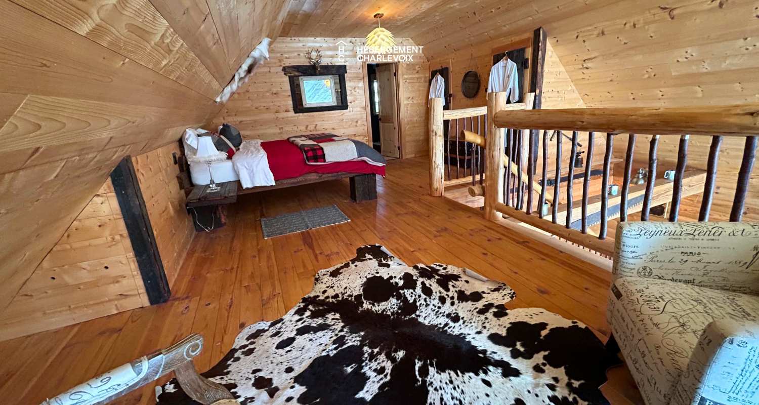 CAB-20 - A very large half-log cabin in the heart of the Canadian forest.