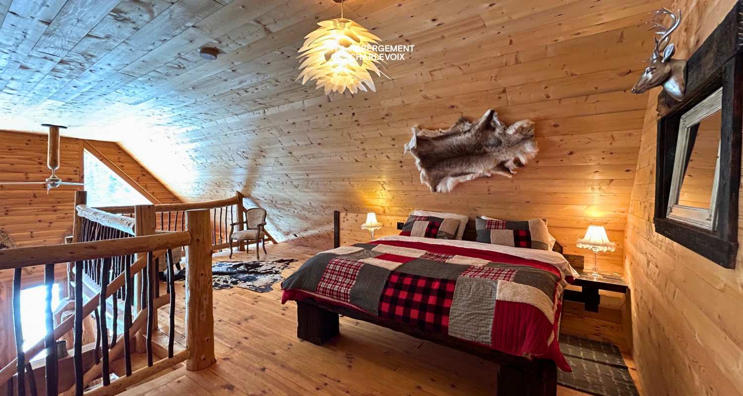 CAB-20 - A very large half-log cabin in the heart of the Canadian forest.