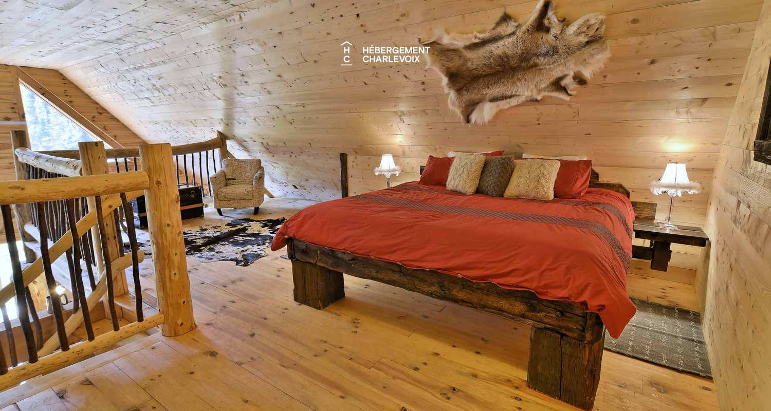 CAB-20 - A very large half-log cabin in the heart of the Canadian forest.