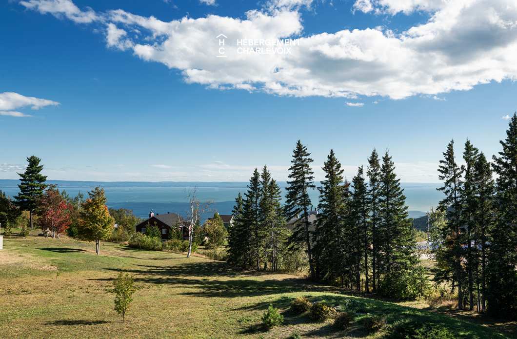 CIN-57-1 - Grand chalet avec 2 unités confortables avec vue sur le fleuve!