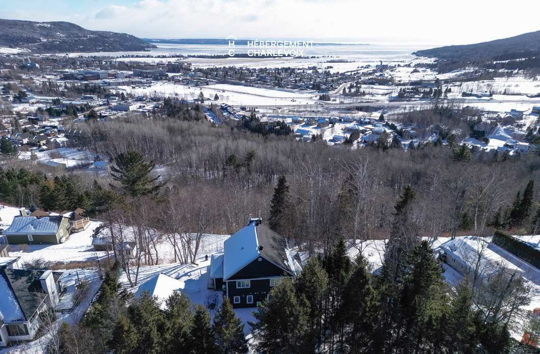 SEN-135-1 - Chalet jumelé avec vue lointaine sur le fleuve