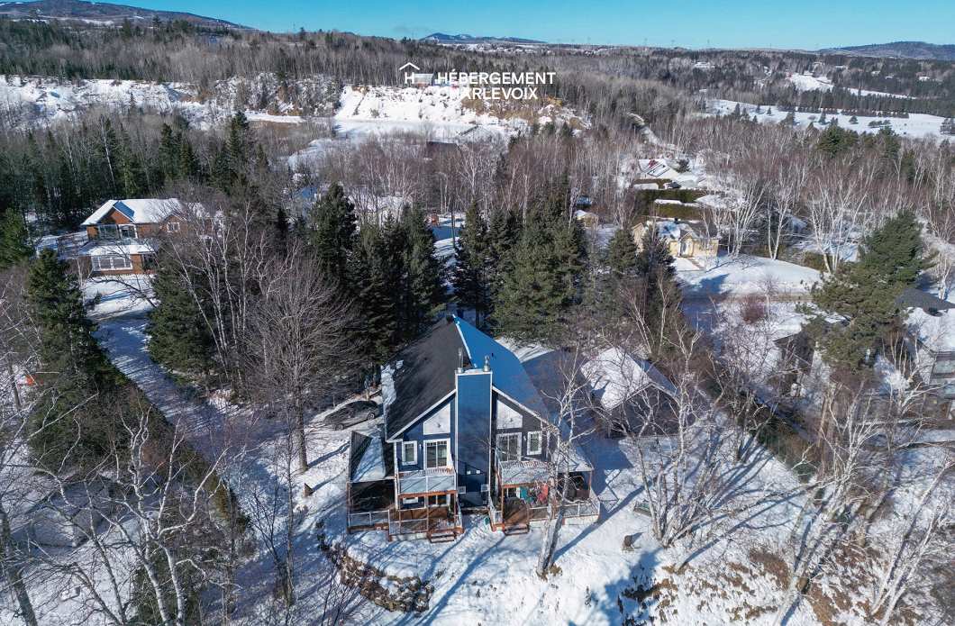 SEN-135-1 - Chalet jumelé avec vue lointaine sur le fleuve