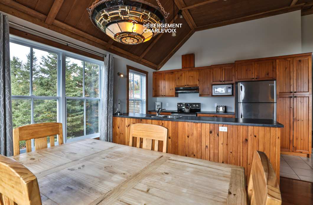 OPUS 121H - Cottage avec vue splendide sur le fleuve St-Laurent