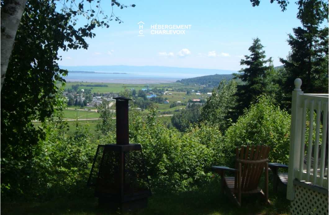 SEN-135-1 - Chalet jumelé avec vue lointaine sur le fleuve