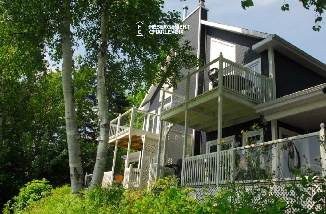 SEN-135-1 - Chalet jumelé avec vue lointaine sur le fleuve