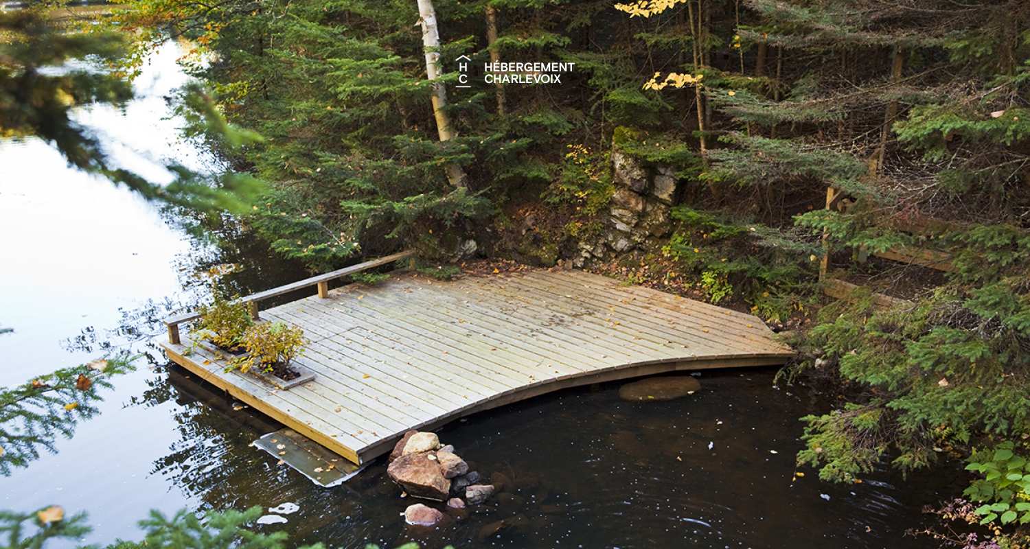 NOUF-256 - Cottage on the edge of a lake with trail, waterfall and pond